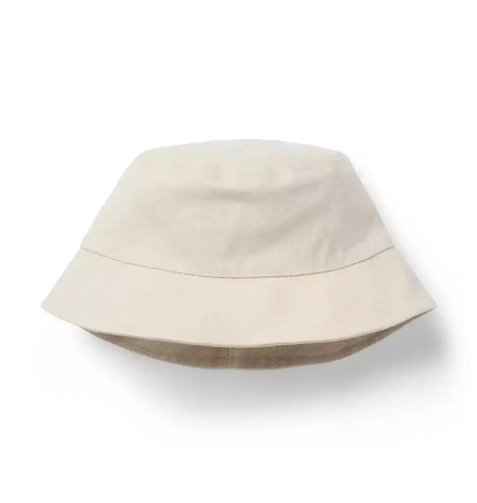 Kids' summer sun hat in beige for outdoor play.