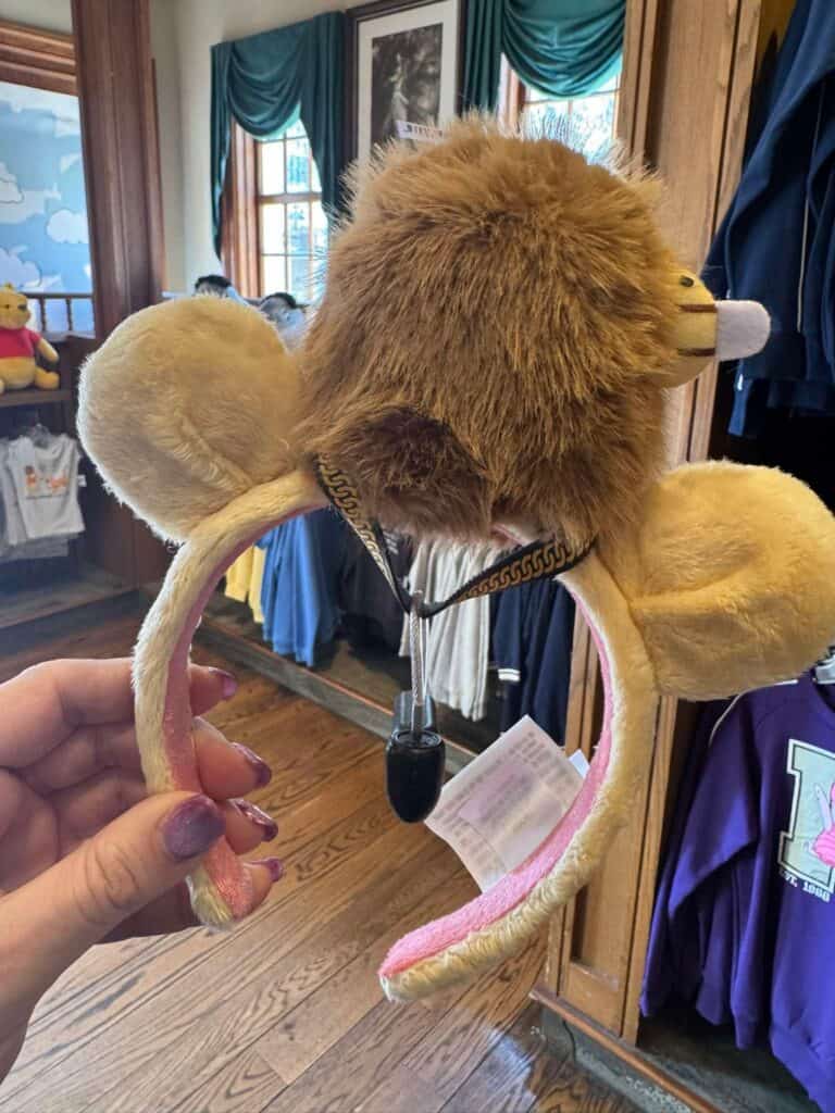 Lion headband with plush mane and ears for Disney fans.