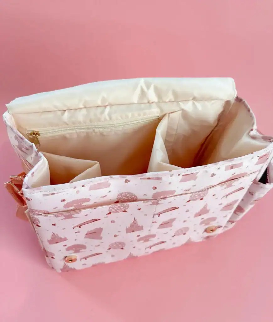 Stylish Disney-themed tote bag with multiple compartments.