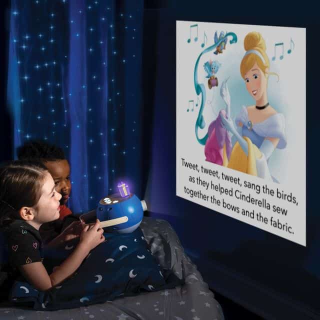 Children watching Cinderella story projection with interactive toy.