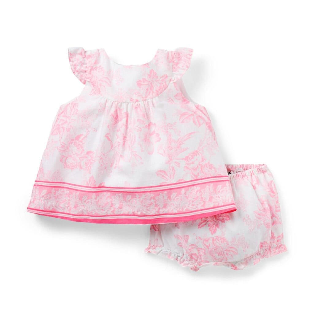 Cute pink and white floral mommy and me dress with matching bloomers for young girls.