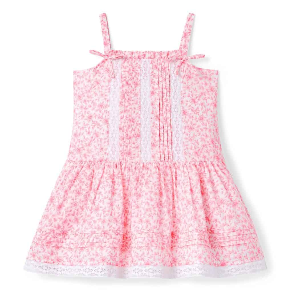 Cute pink Disney-inspired girl's dress with floral print and lace accents for special occasions.
