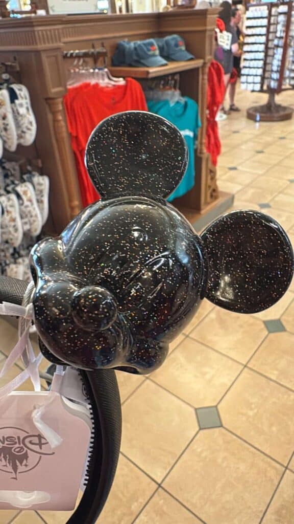 Galaxy Mickey Mouse ear headband with starry night design.