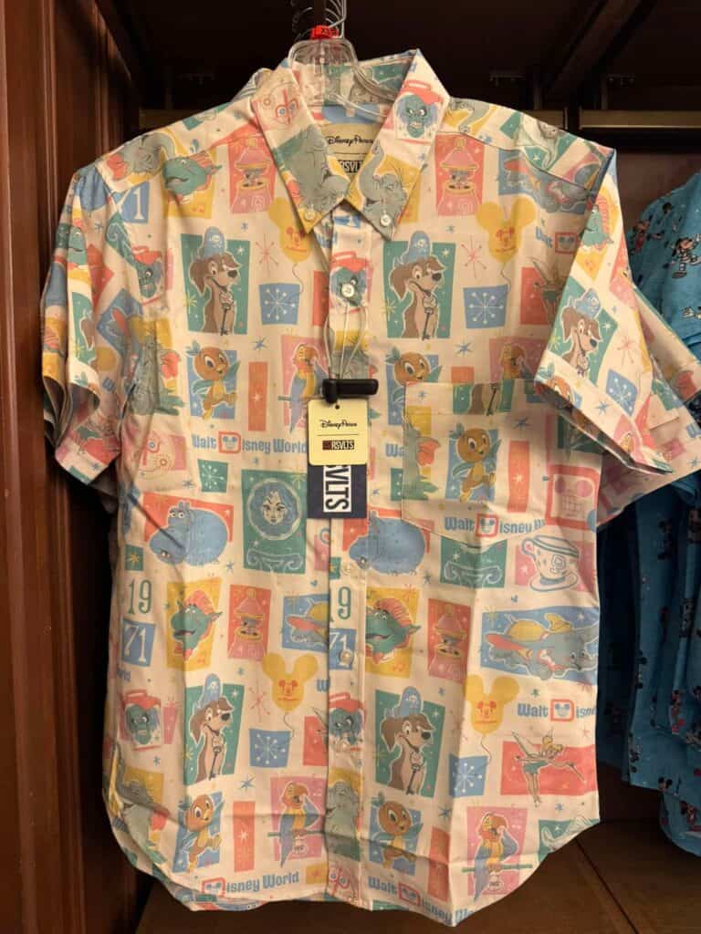Disney-themed short sleeve button-up shirt with colorful cartoon characters.