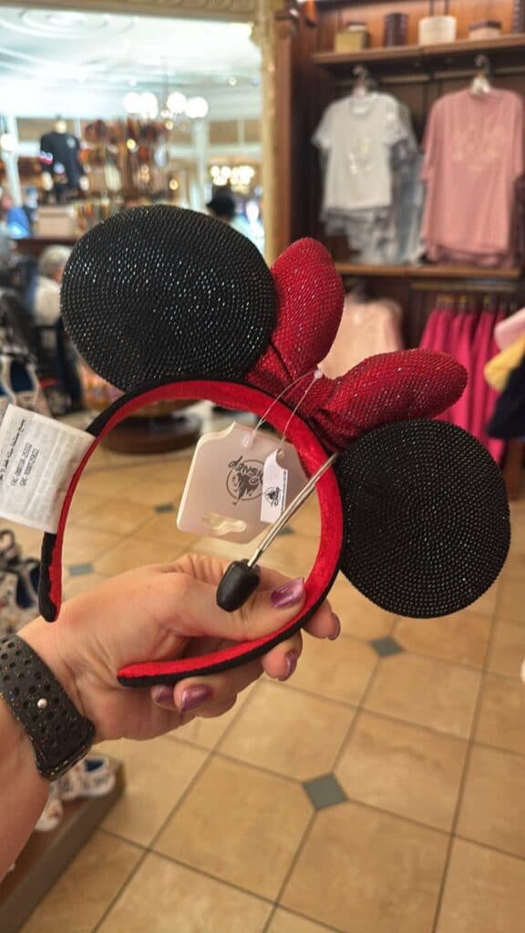 Cute Minnie Mouse ear headband with black and red sequined ears. Perfect for Disney fans and themed.