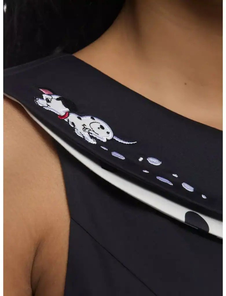 Minnie Mouse embroidery on black dress collar.