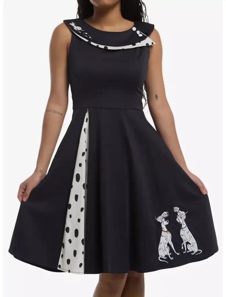 Elegant black dress featuring Dalmatian dog embroidery and polka dot accents, perfect for Disney fas.