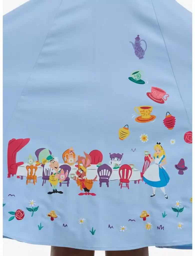 Disney princess-themed dress with tea party design and colorful characters.