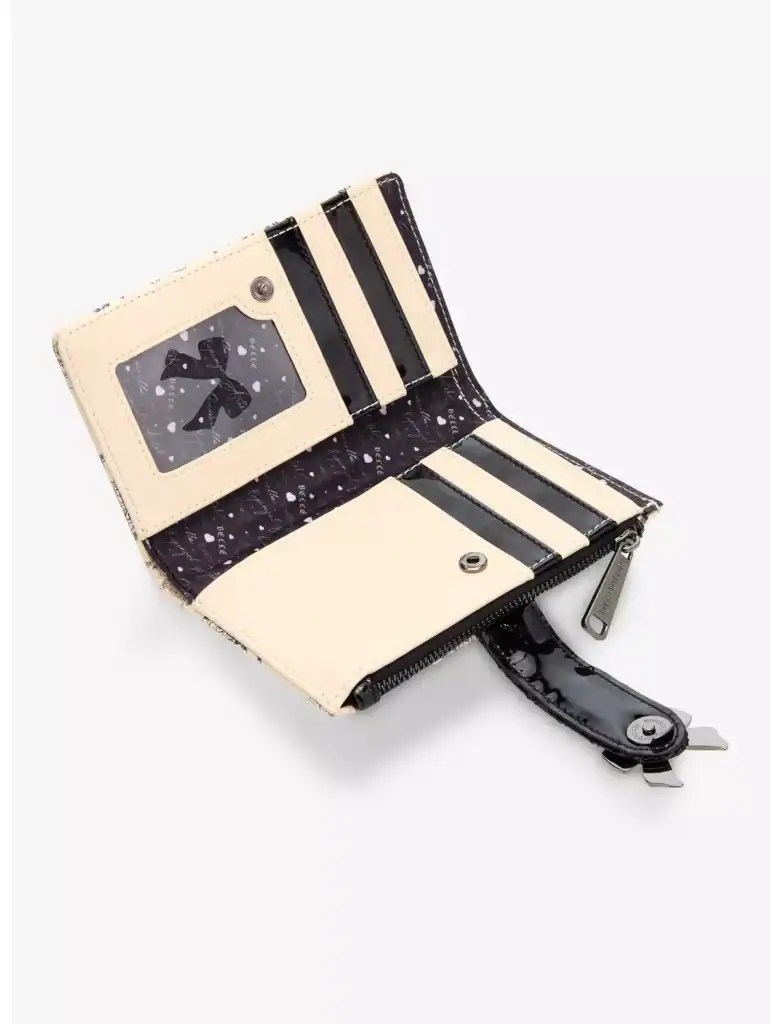 Stylish Disney bow-themed wallet with zipper and card slots.