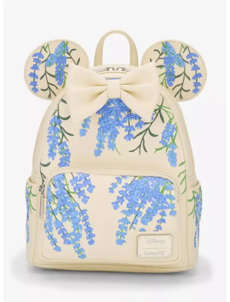 Minnie Mouse-themed backpack featuring blue floral patterns and a large bow, perfect for Disney fans.