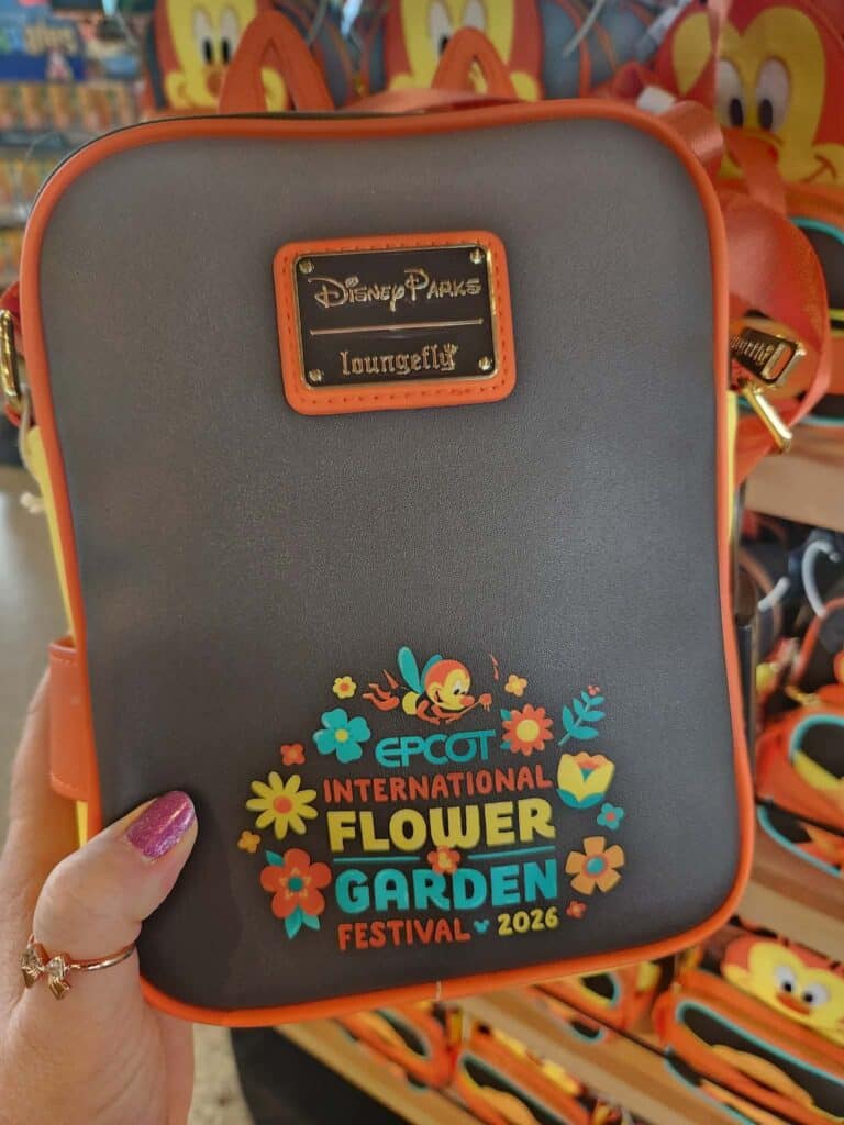 Epcot Flower Garden Festival bag with Disney character design.