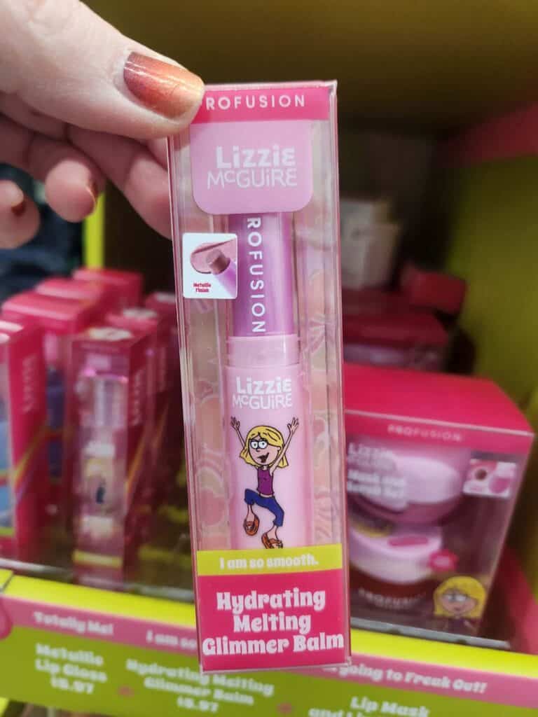Lip gloss in pink packaging with Lizzie McGuire illustration.