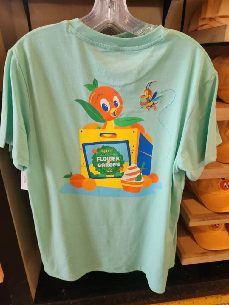 Cute Disney Flower Garden T-shirt with animated character and colorful design.