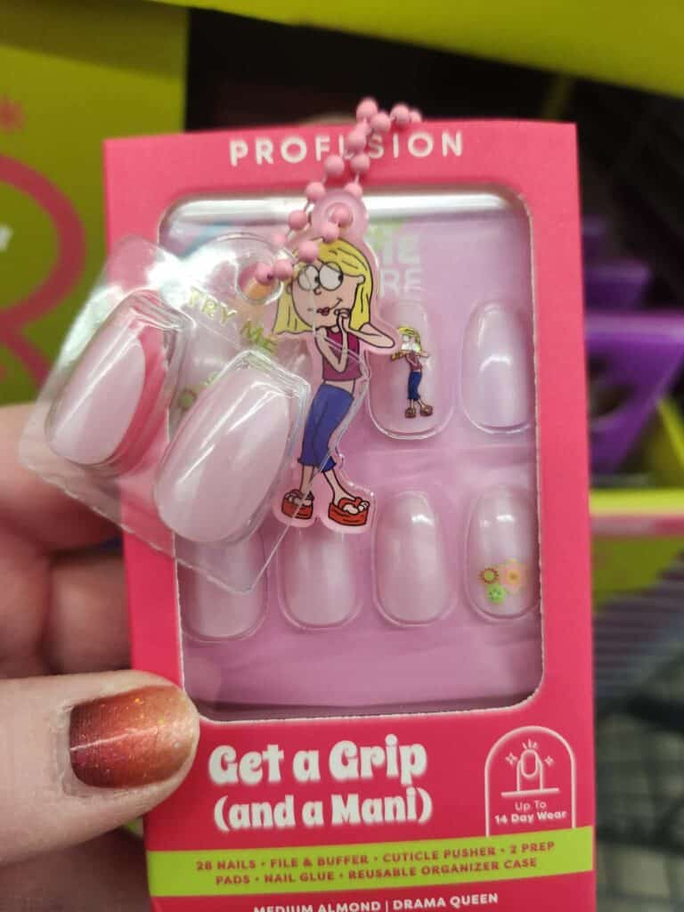 Disney-inspired nail art set with cartoon character design and accessories.