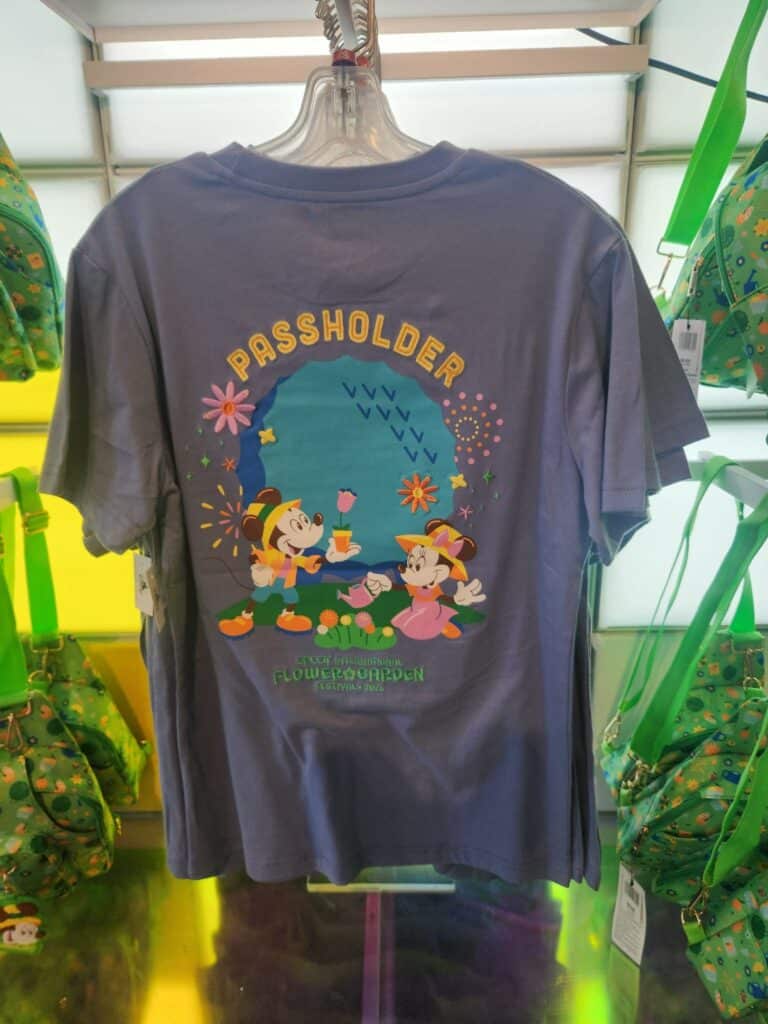Disney passholder T-shirt featuring Mickey and Minnie Mouse with colorful design.