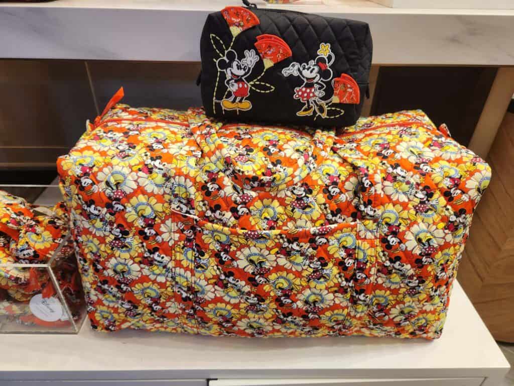 Mickey and Minnie floral print bag with Disney x Vera Bradley Petal Multi design.