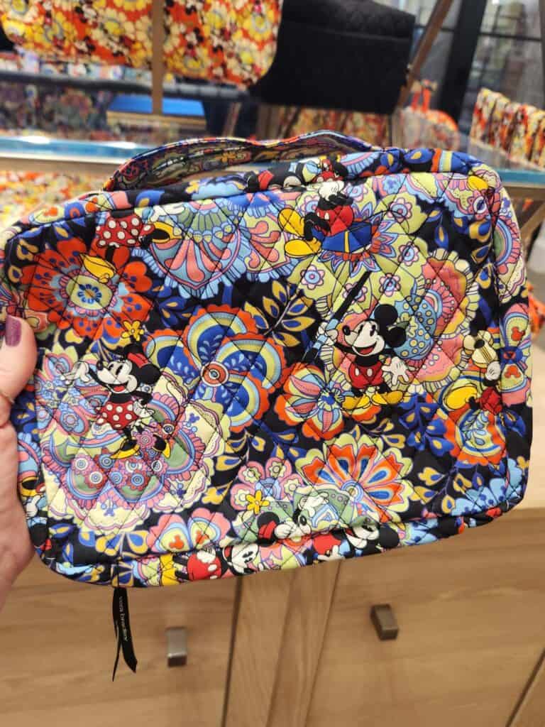 Mickey and Minnie on floral Petal Collection bag, Disney x Vera Bradley collaboration, colorful and.