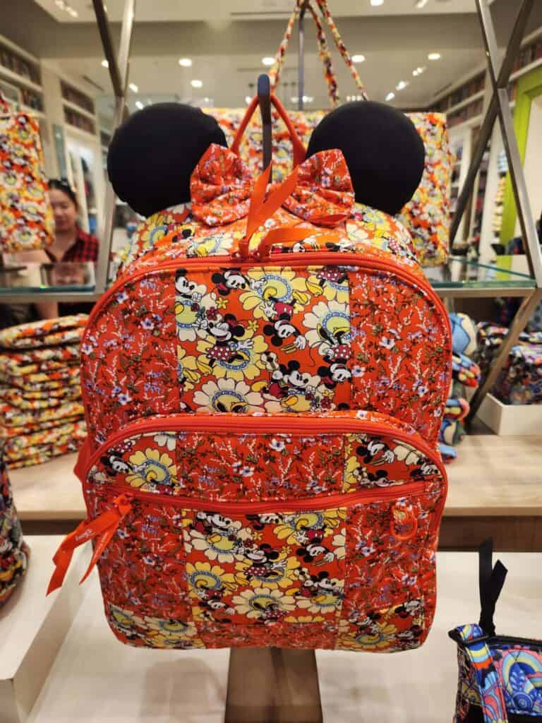 Colorful Mickey and Minnie floral backpack with Disney x Vera Bradley design and Minnie ears.