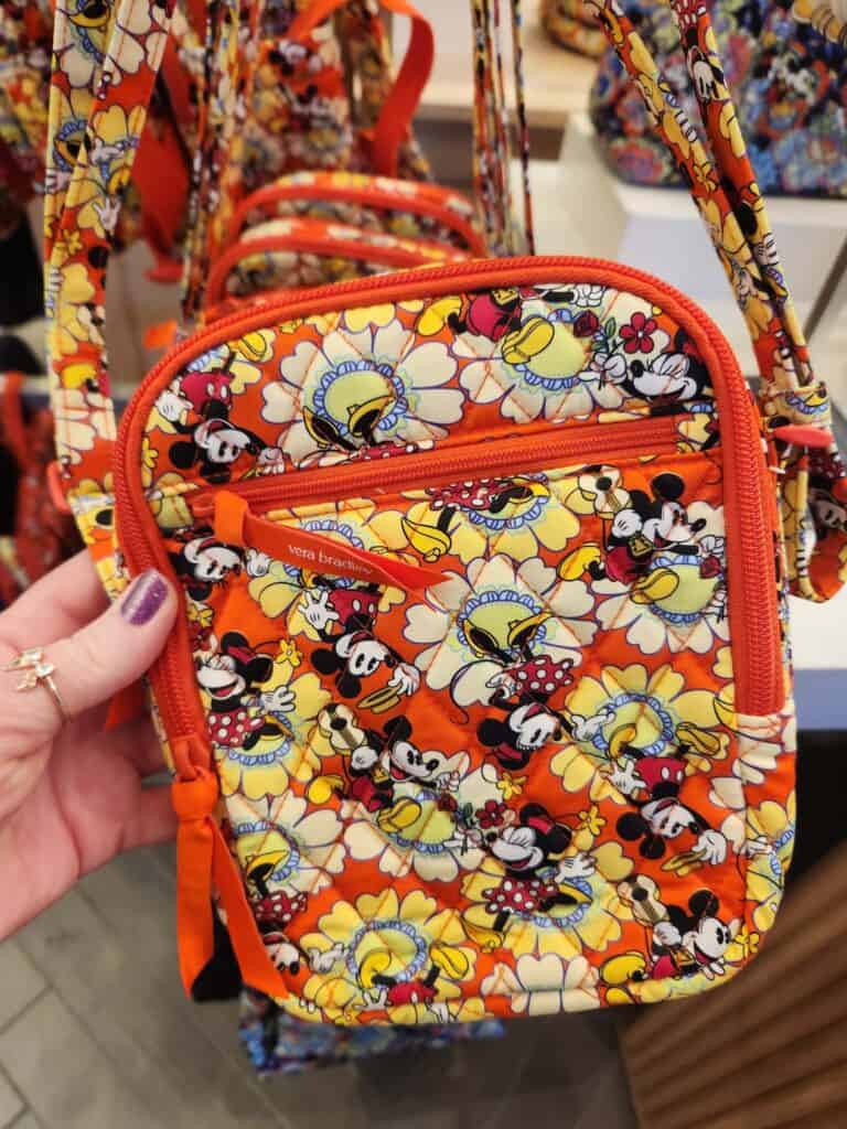 Colorful Mickey and Minnie floral print bag from Disney x Vera Bradley collection.