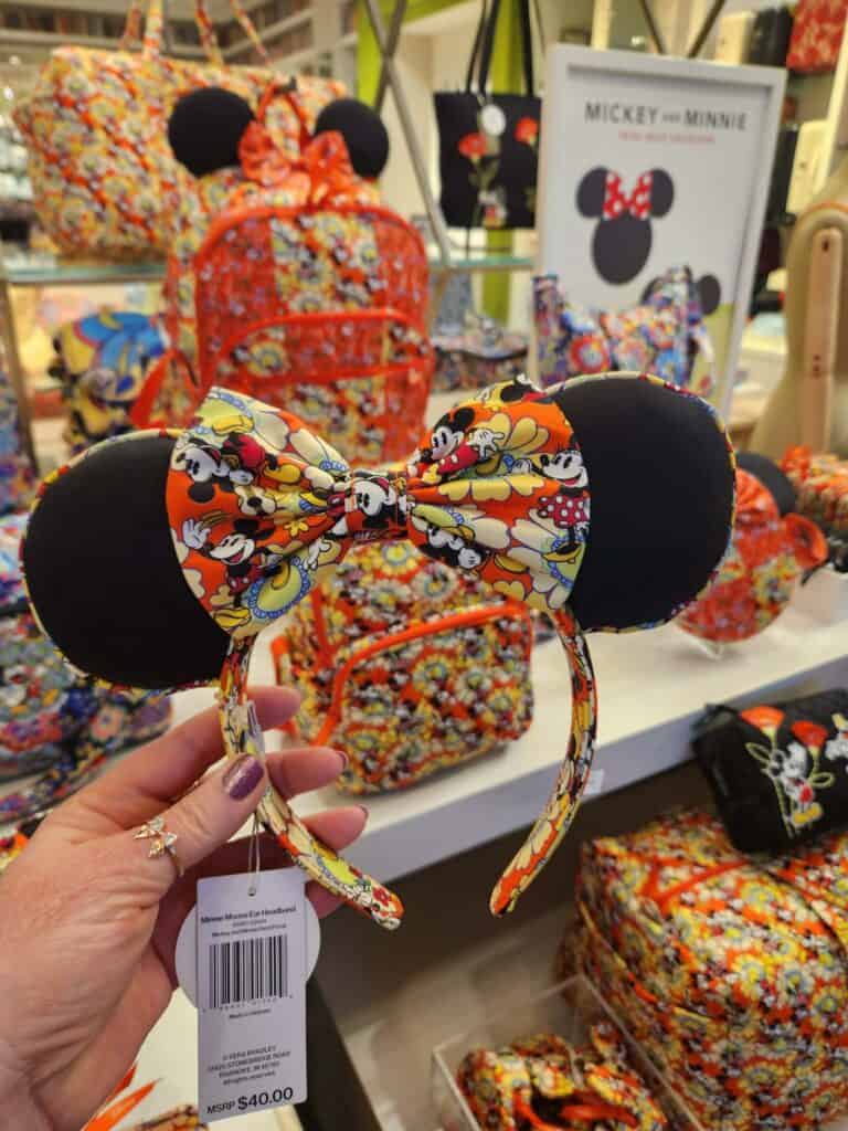 Mickey and Minnie floral bloom Minnie ears headband with bow, perfect for Disney fans.