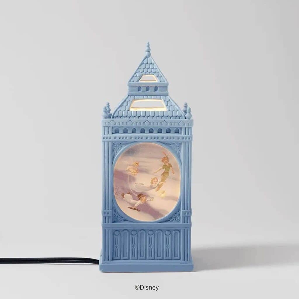 Blue Disney-themed snow globe lamp with dancing characters, perfect for Disney fans.