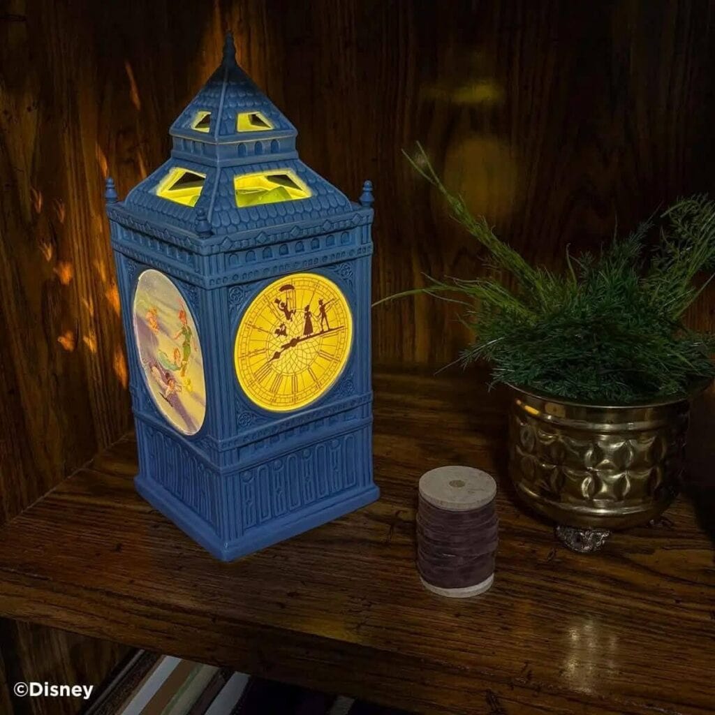 Night light shaped like Big Ben in London, with Disney characters on the side.