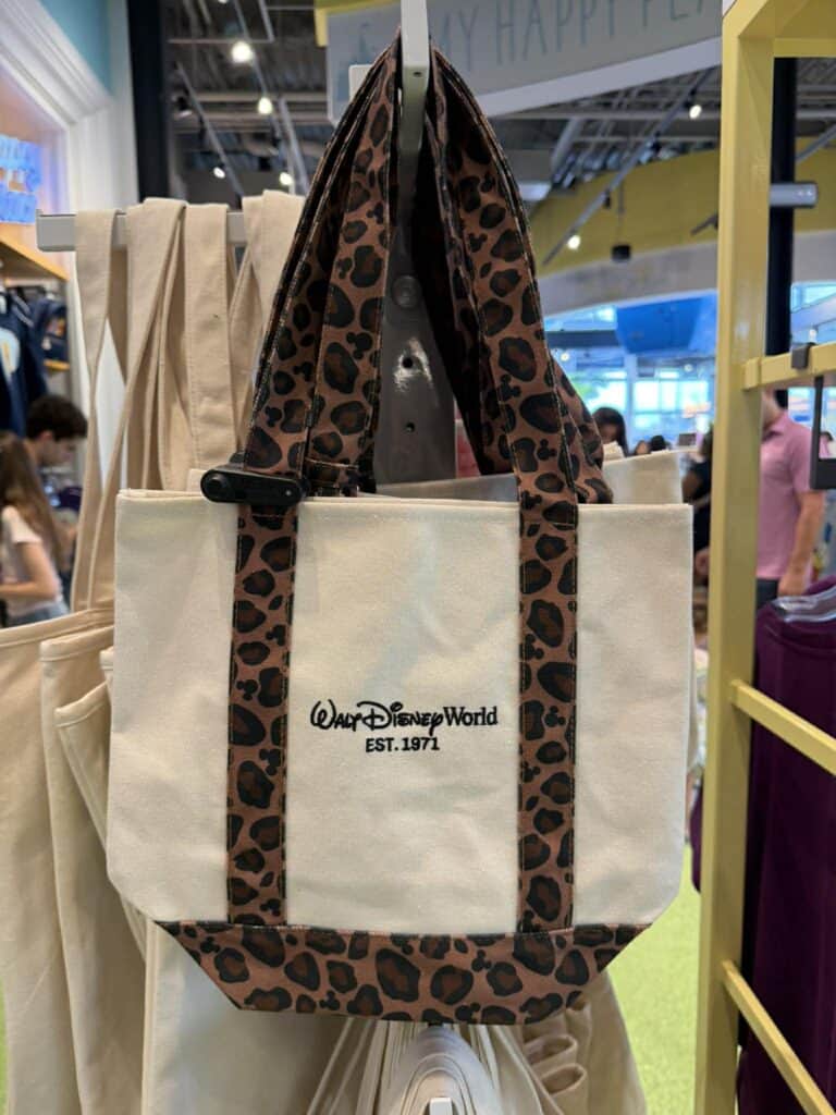 Disney leopard print tote bag with "Walt Disney World" logo, stylish and functional.