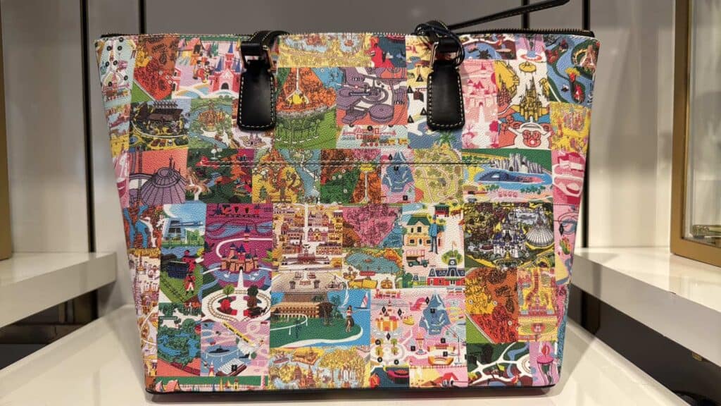 Colorful Disney-themed tote bag with various iconic characters and scenes.