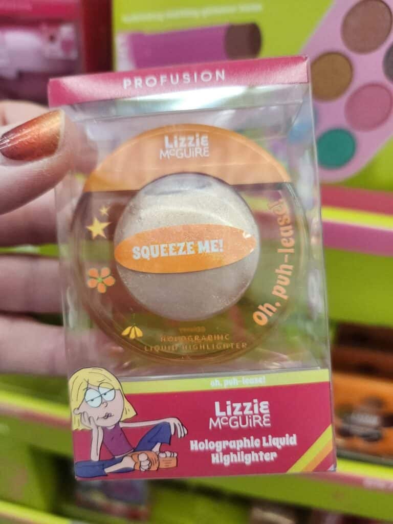 Holographic liquid highlighter inspired by Lizzie McGuire, featuring a shimmery, iridescent finish f.