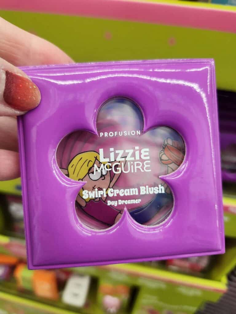 Lizzie McGuire Swirl Cream Blush in purple, a fun Disney-themed makeup product.