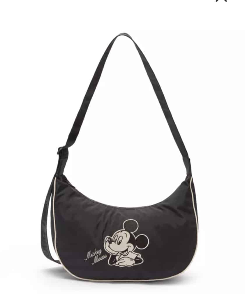 Black Mickey Mouse tote bag with adjustable strap and Mickey illustration.