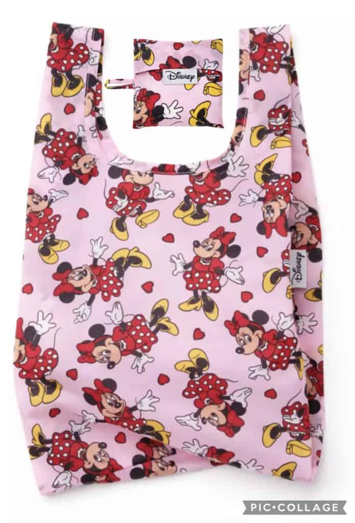 Disney Minnie Mouse tote bag with red polka dots and yellow accents.