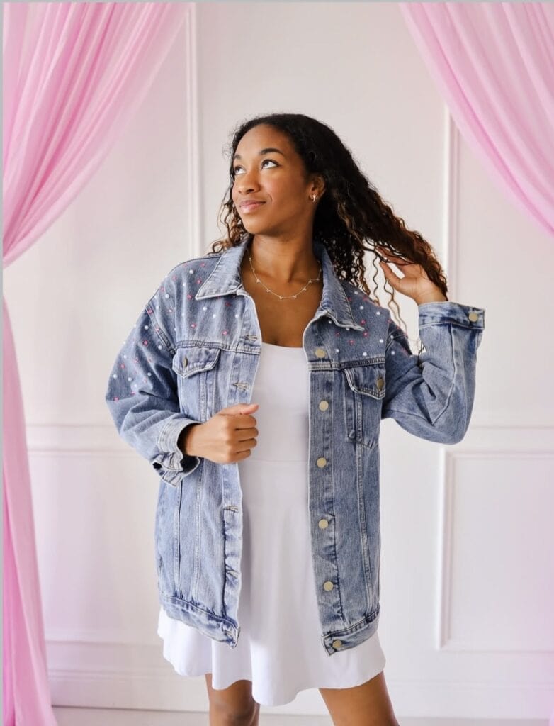 Stylish denim jacket with pearl details, perfect for Disney-inspired fashion looks.