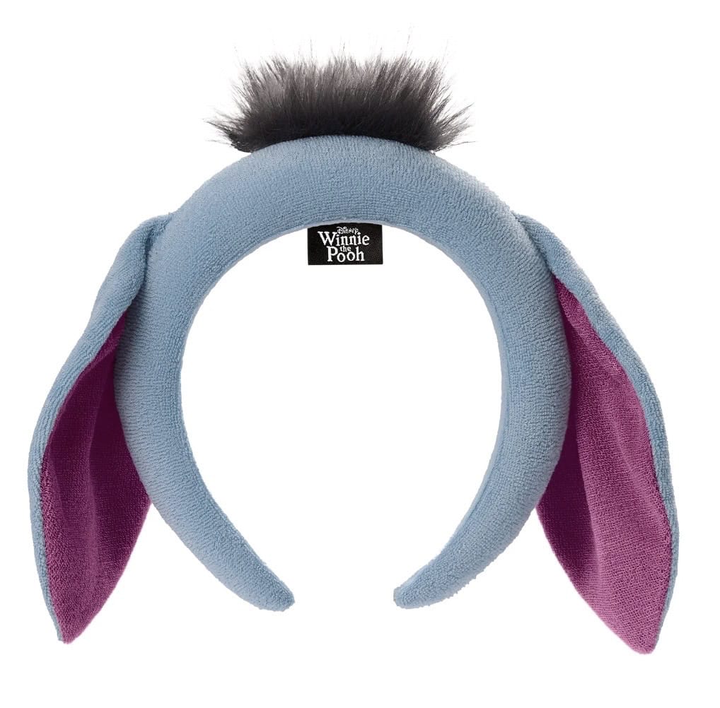 Winnie the Pooh Eeyore headband with plush ears and tufted top.