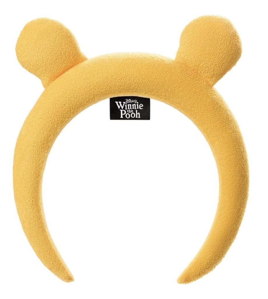 Yellow Winnie the Pooh plush headband with bear ears for kids and adults.