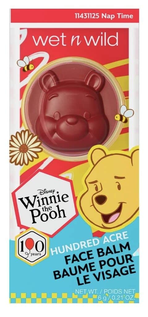 Winnie the Pooh face balm in red packaging with bees and floral design.
