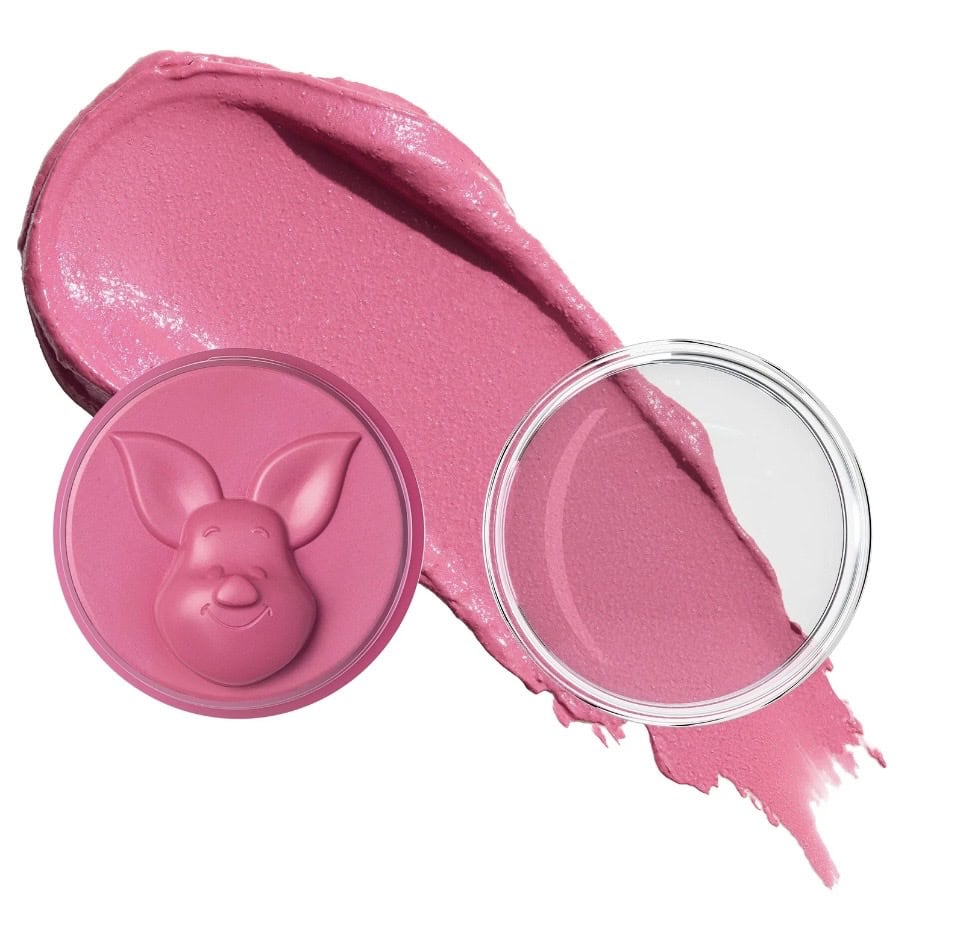 Pink bunny-shaped lip balm with smooth, glossy texture.