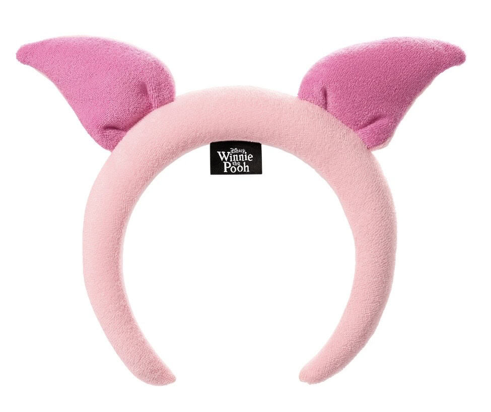 Pink Winnie the Pooh Piglet ears headband, perfect for Disney-themed costumes and accessories.