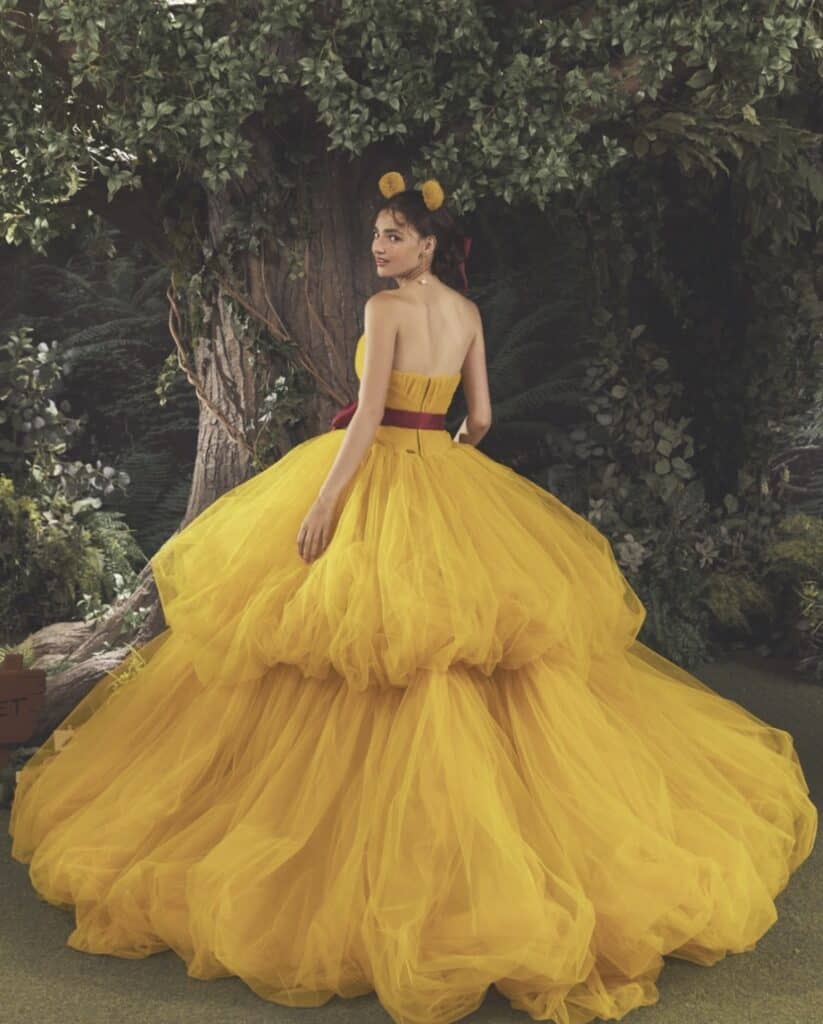 Yellow tulle ball gown inspired by Disney princess costumes.