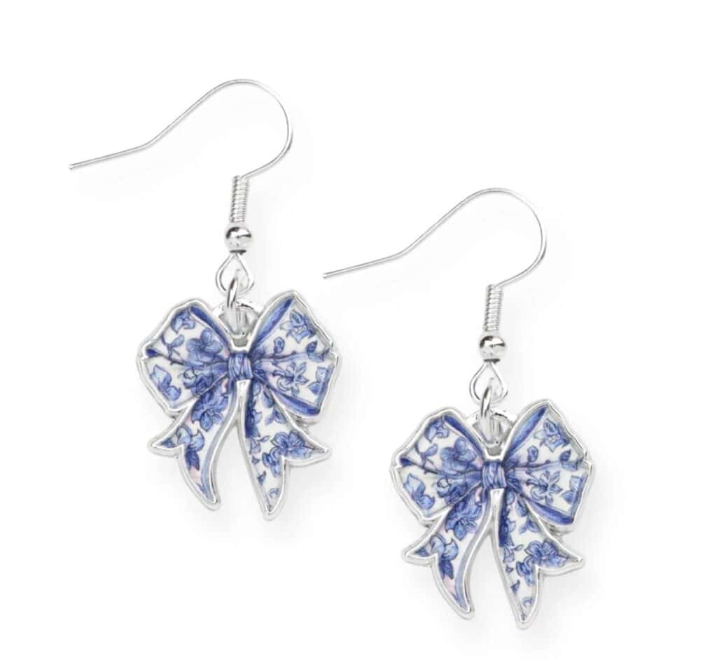 Blue bow earrings with floral pattern, perfect for Disney-inspired fashion accessories.