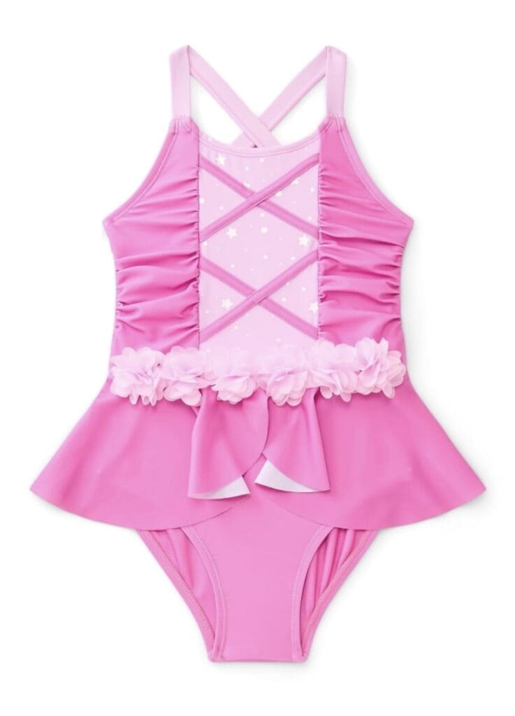Pink Disney princess ballet leotard with ruffle skirt and crisscross strap design. Perfect for dance.