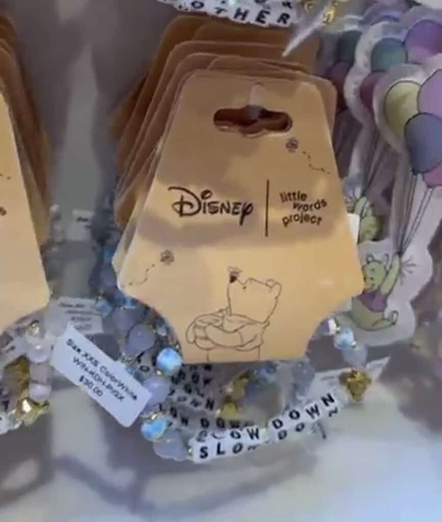 Bracelet featuring Disney characters and "Slow Down" message for kids.
