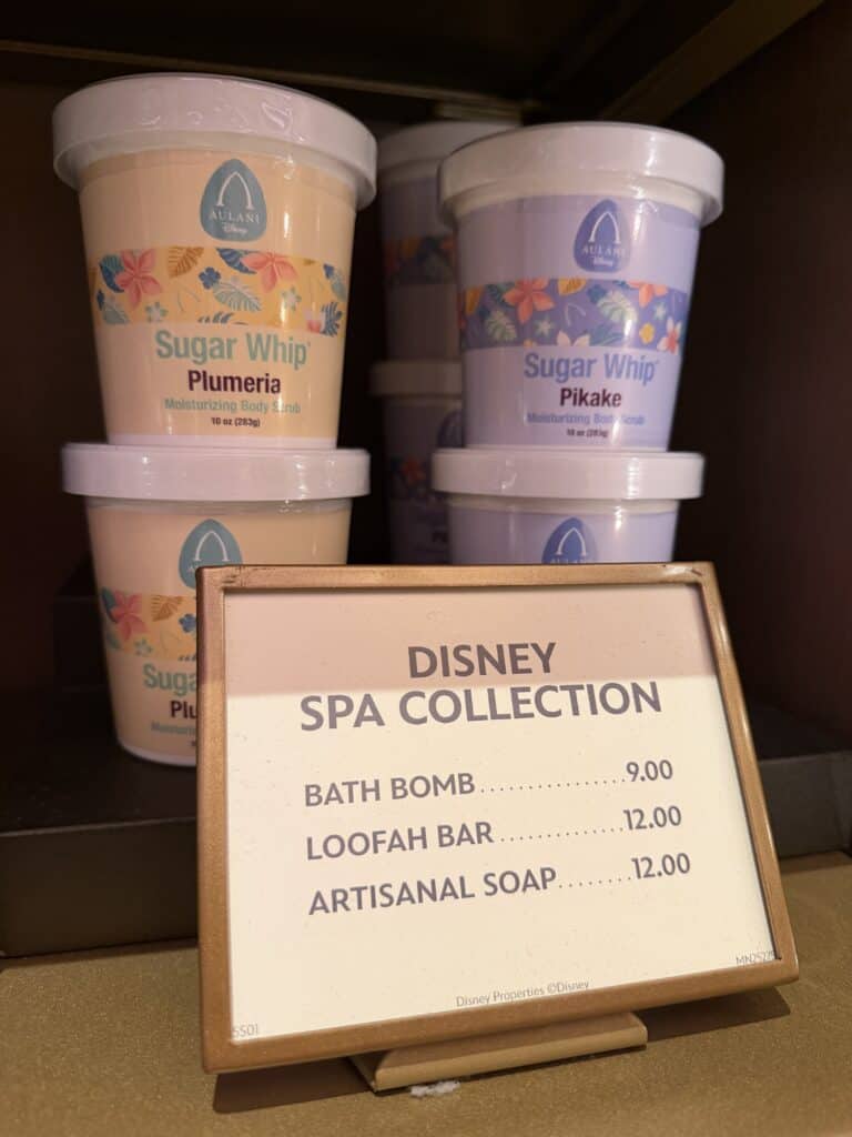 Disney Spa Collection body creams and soap in colorful containers.