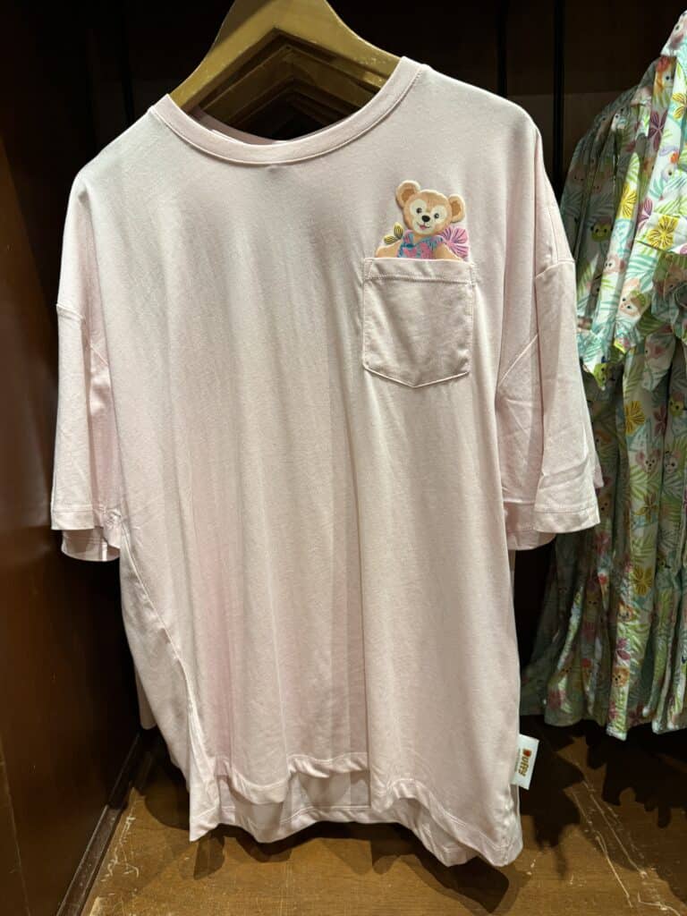 Cute Disney-themed T-shirt with a bear pocket detail.