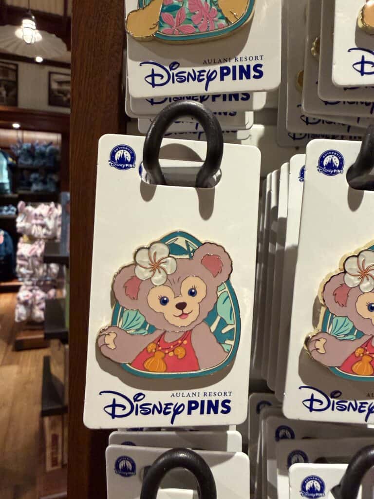 Disney pins featuring Aulani Resort character, perfect for Disney fans.