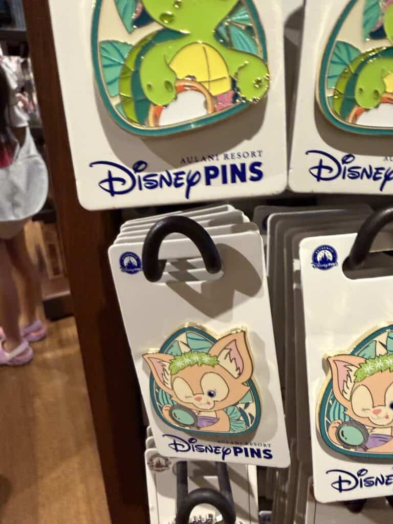 Disney Pins featuring colorful animal characters and vibrant designs.