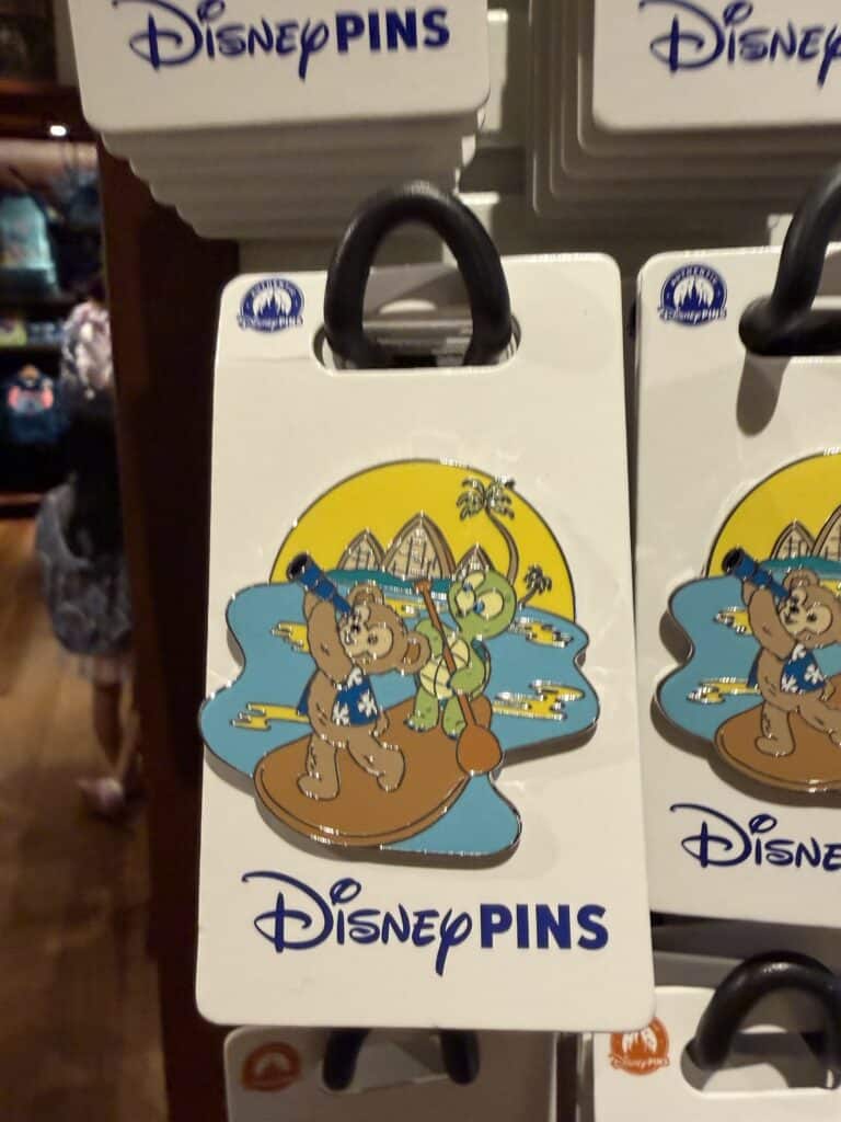 Disney Pins bear and friend keychain featuring classic Disney characters.