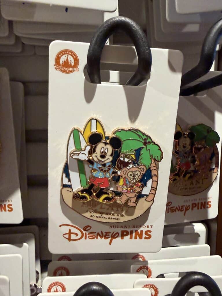 Mickey Mouse and friends Disney pins with surfing theme, perfect for Disney collectors and fans.
