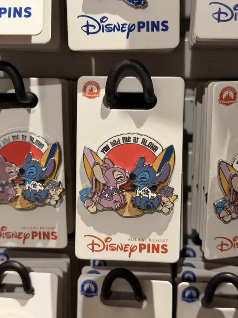 Disney Pins featuring Stitch and Angel from Lilo & Stitch.