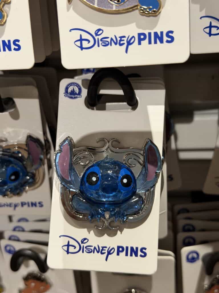 Disney Stitch pin from Lilo & Stitch on display at Disney store.